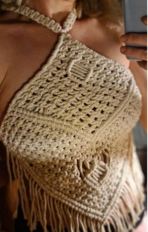 Close-up of macrame crop top weaving pattern, handmade cotton festival top
