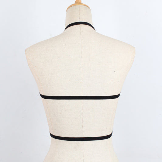 Strap harness bra - back view showing bold design
